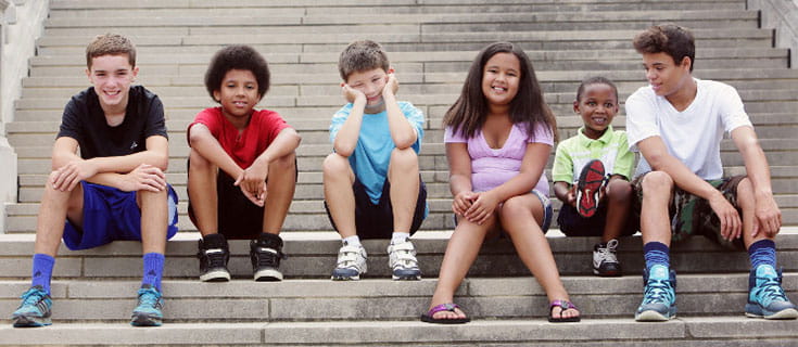 A photo of smiling kids.